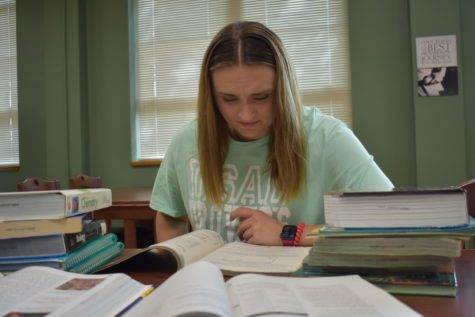  Sophomore Kylie Milanic is utilizing Nash Library resources as she logs in her mandatory study hall hours for the week. 