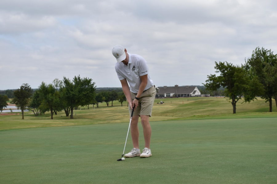 Grant Murphey, champion of the Battle at Winter Creek, looks to sink a putt earlier this season at USAOs home course. 