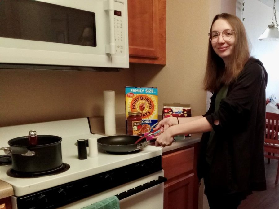Freshman Hannah Woodhouse prepares what she hopes will be a delicious Thanksgiving meal.
