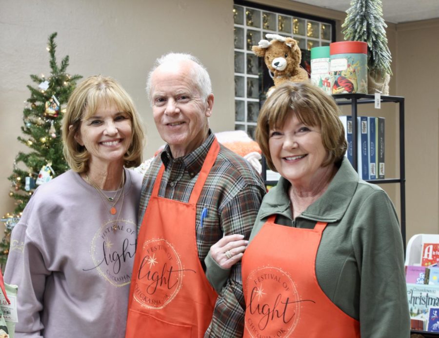 If the night is chilly, visitors might be tempted to stop in the gift shop area to pick up warm goodies, like hot cocoa, and chat with this merry trio of volunteers. 