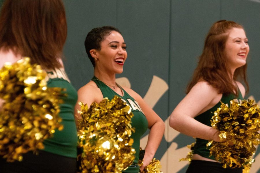 Laynie Sapp and Ceara Turpin, both Drover Dancers, prepare another cheer to get the crowd on their feet and support the Drover teams. 