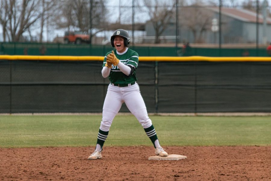 Jadyn Goucher shows her excitement after shooting a ball into the outfield for a double. 