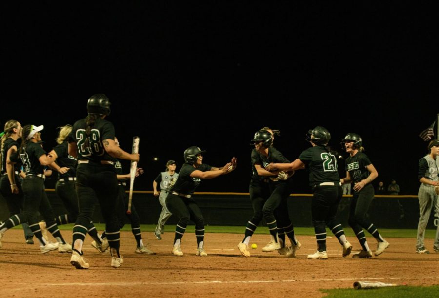 The Drovers emptied their dugout to celebrate with Sierra Selfridge after her game-winning at bat against OCU.