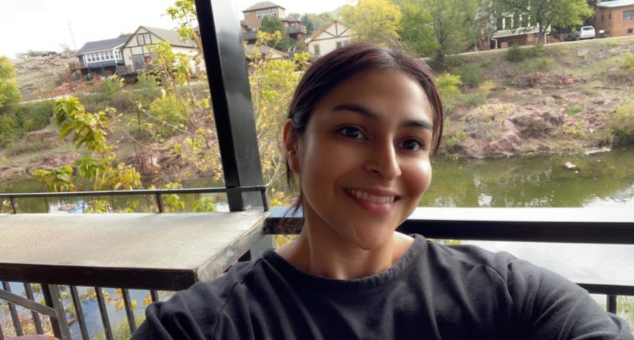 While enjoying a moment at Medicine Park, Gisela Alonso pauses to smile. Alonso sahres a few pieces of advice for those in their 20s that she learned the hard way. 