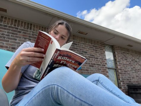 Emily Loughridge soaks up some sun while reading Killers of the Flower Moon. What are her thoughts on David Granns book?