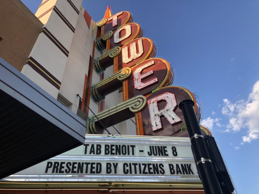 The historic Tower Theater sign proudly boasts a wide variety of entertainers, including Tab Benoit and his blues.