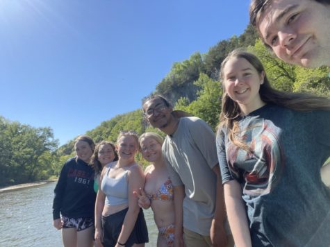While taking a break from their daily canoeing, part of the 11-person crew smiles for the camera, including (from left) Hayley Forsblom, Cierra Shelton, Katelyn Hicks, Bea Bourland, Kristopher Rogers, Abigail McNabb, and Patrick Zinn. 