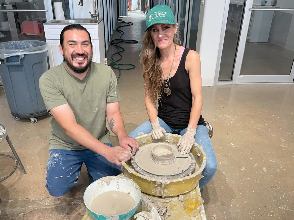Jordan Vinyard, director of Art Wrecker Studios, pauses working on her pottery piece during the Tipsy Pottery event that Freddy Baeza, special instructor of art, taught at the end of July. 
