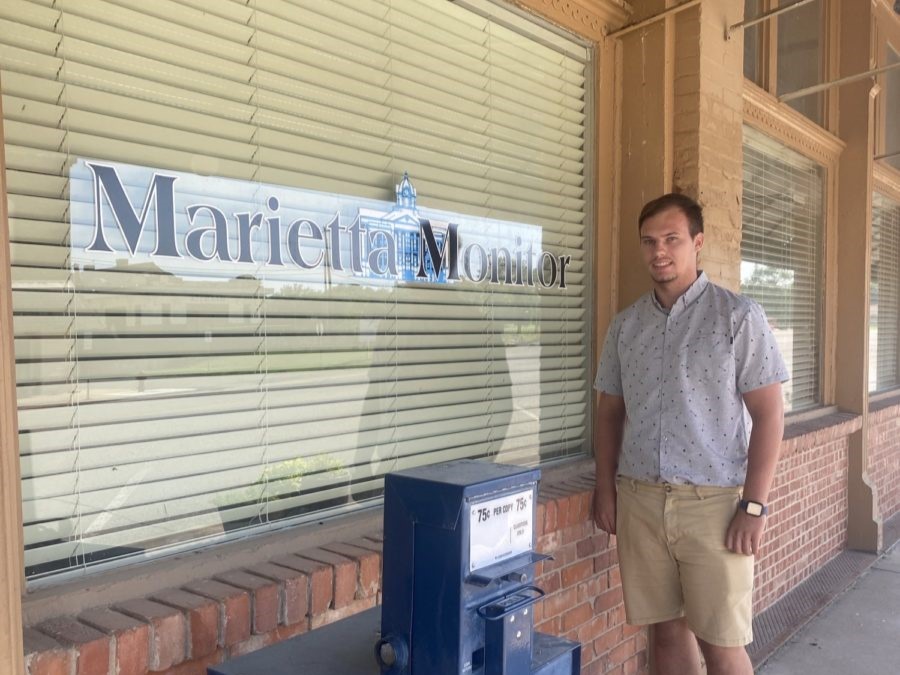 Gary Jackson, junior Communication major, stands outside of the Marietta Monitor, where he spent much of his summer at in internship at the Monitor. 