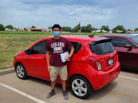 Paul Tointigh spent his first two years of college at Redlands Community College. Here Paul is pictured during his second year with his brand new car.