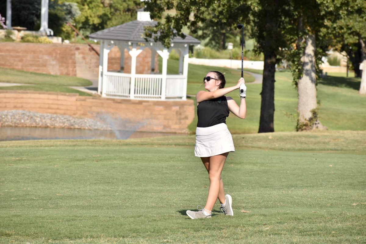 Earlier in the season, Emma Fields hit her second shot at Winter Creek Golf Course in Blanchard. 