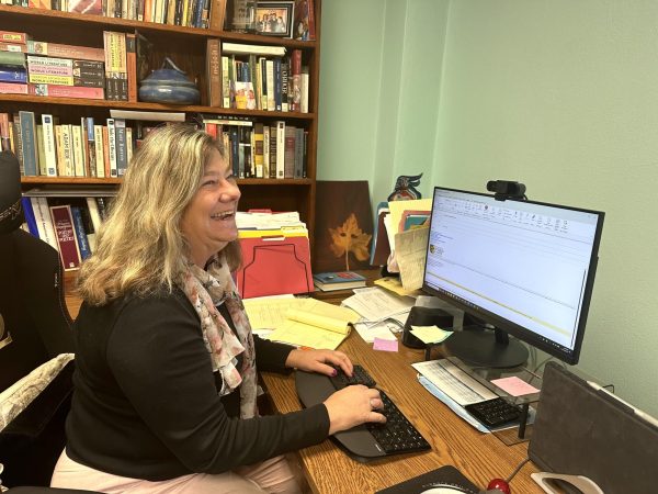 Dr. Brenda Brown works in her office on USAOs reaccreditation process. 