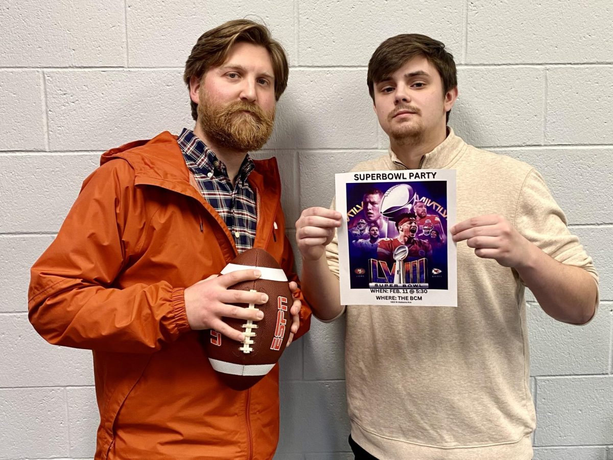 BCM Director Joseph Quickle and his intern Noah Holden prepare the BCM for their annual Super Bowl party. 