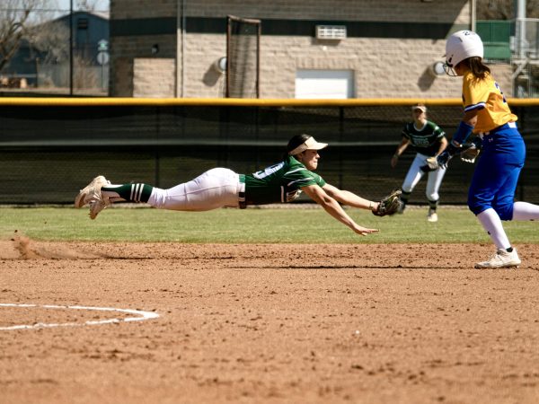 Jadyn Goucher lays out for a line drive hit against Wayland Baptist University earlier in the season. 