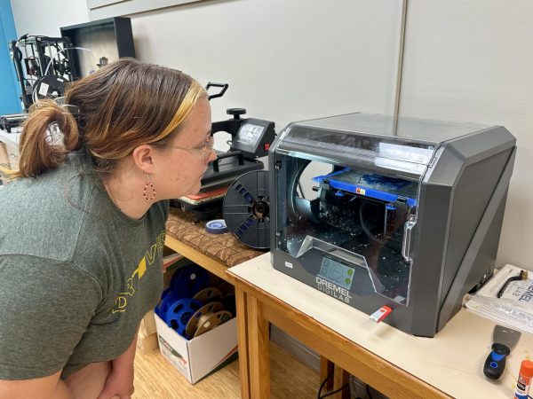 Bea Bourland examines a 3D printer as she tries to decide which Independent Study course to enroll in. 