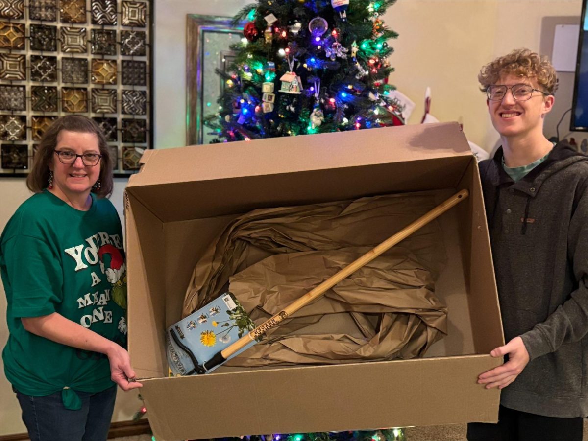 Sports Editor Matthew Yokum showcases the gardening tool he gave his mom as a gift. 