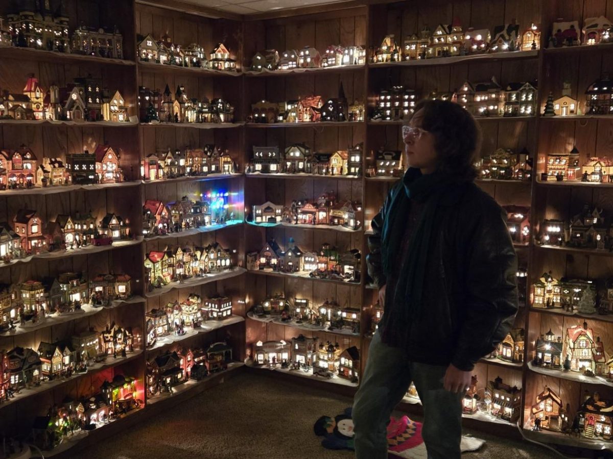 Entertainment Editor Thomas Buchanan looks around in awe at his grandparent's Christmas village collection. 