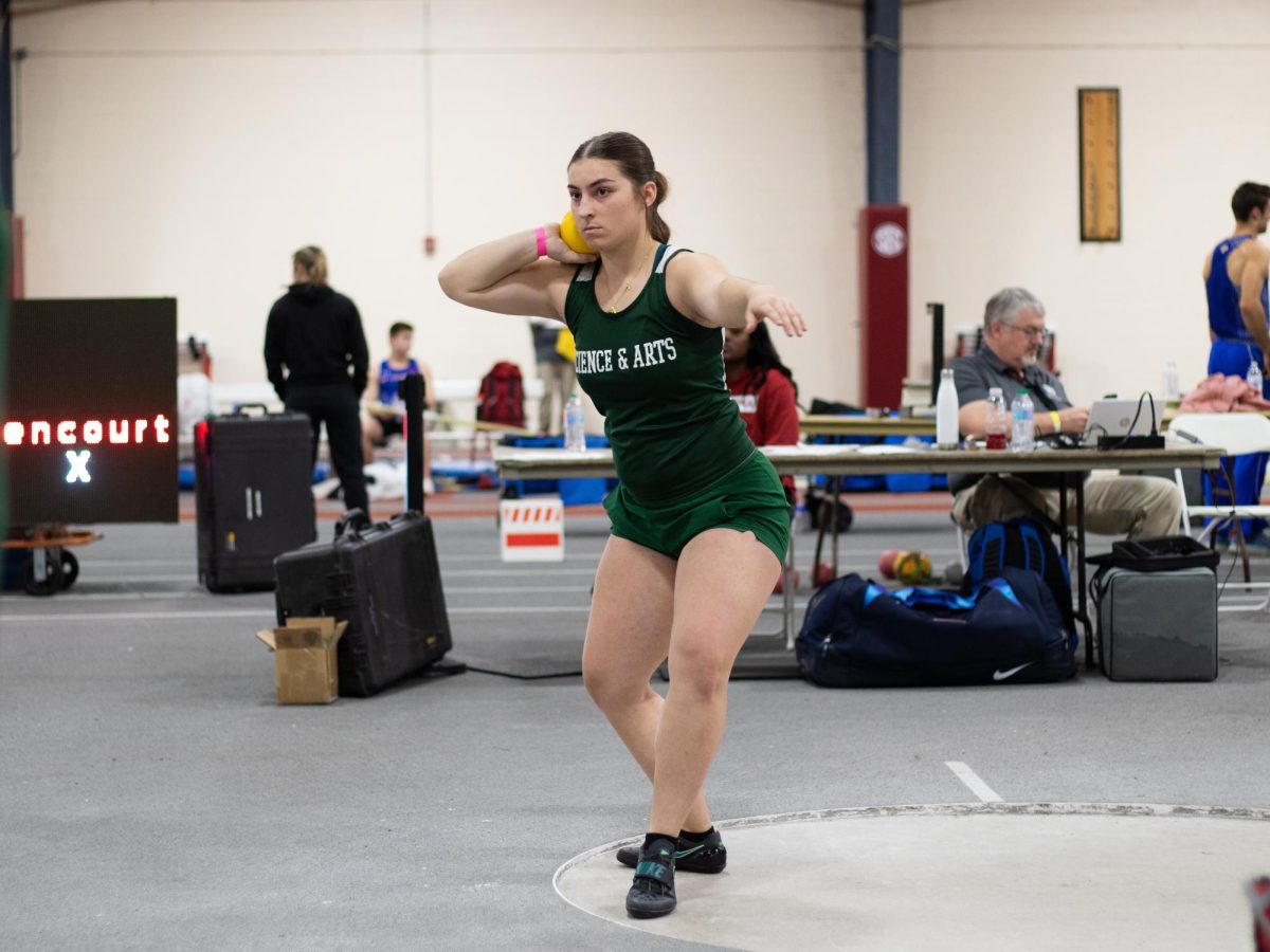 Freshman Kyli Reser prepares to throw in shotput at the Owen Hewitt Invitational earlier this season. 