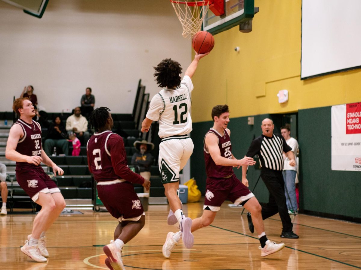 Senior Jaden Harrell goes for a layup against the College of the Ozarks. 