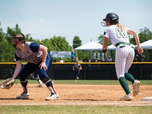 Junior Malea McMurtrey prepares to take off from first base during USAO's game against Midland University in the 2024 season