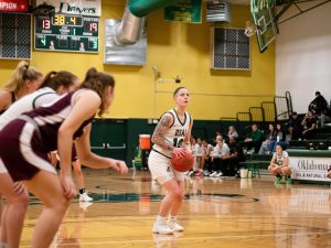 Junior Evangelia Davlakou prepares for a free throw shot against the College of the Ozarks.