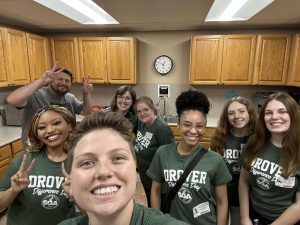 A team of Drovers pose after helping prepare peanut butter sandwiches with the Chickasha Lions Club.