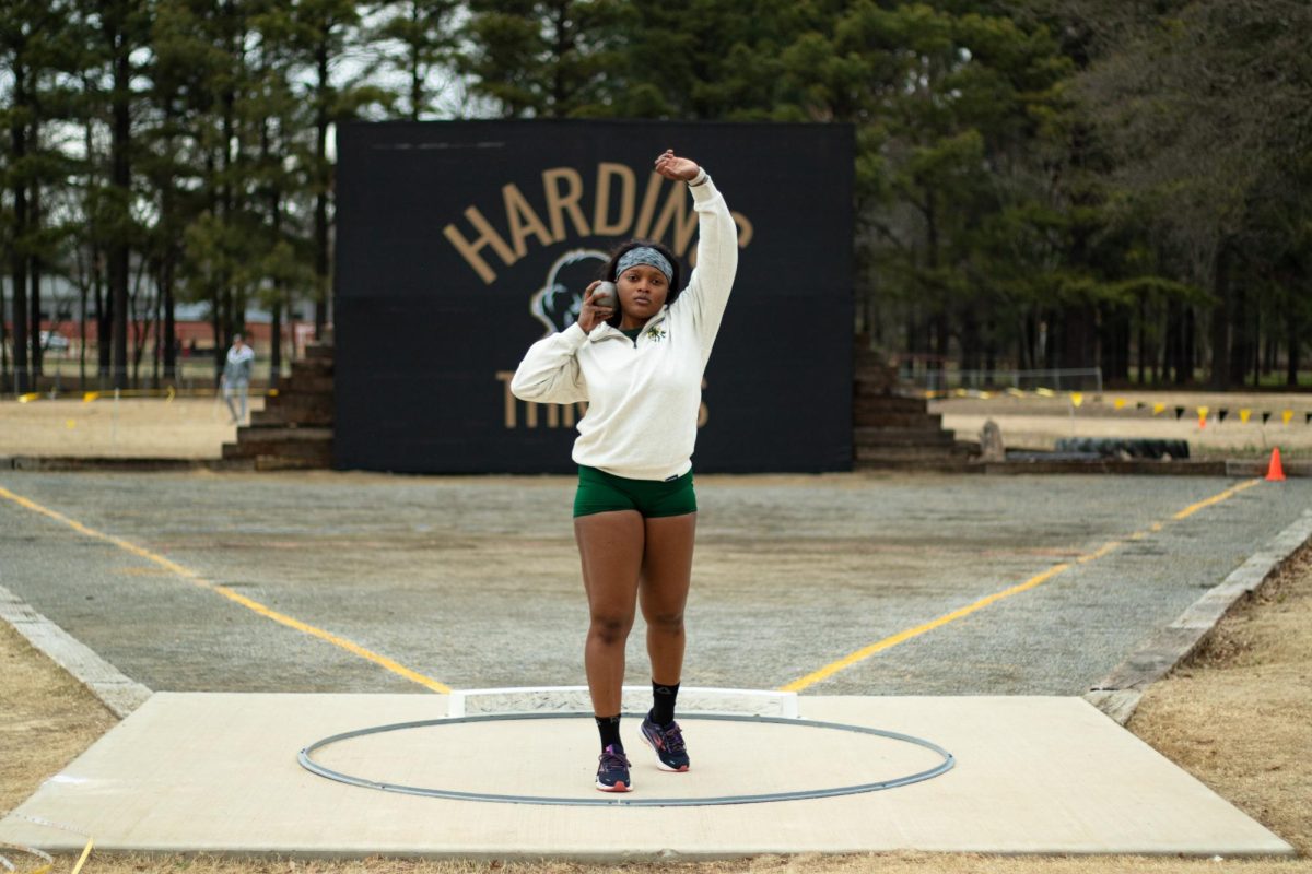 Kyra Willet focuses as she prepares to compete in shotput at the Harding Invitational in Searcy, Ar. 