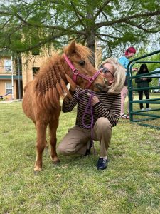 President Hale enjoyed the petting zoo during Finals week 2024
