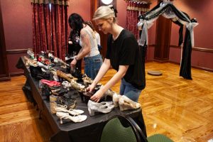 Kassidy Pameticky and Maddyson McMorris sort donations for the annual Prom Boutique.