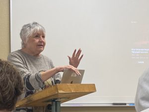 Dr. J.C. Casey teaches the origins and evolutions of language to her Mass Communication course. 