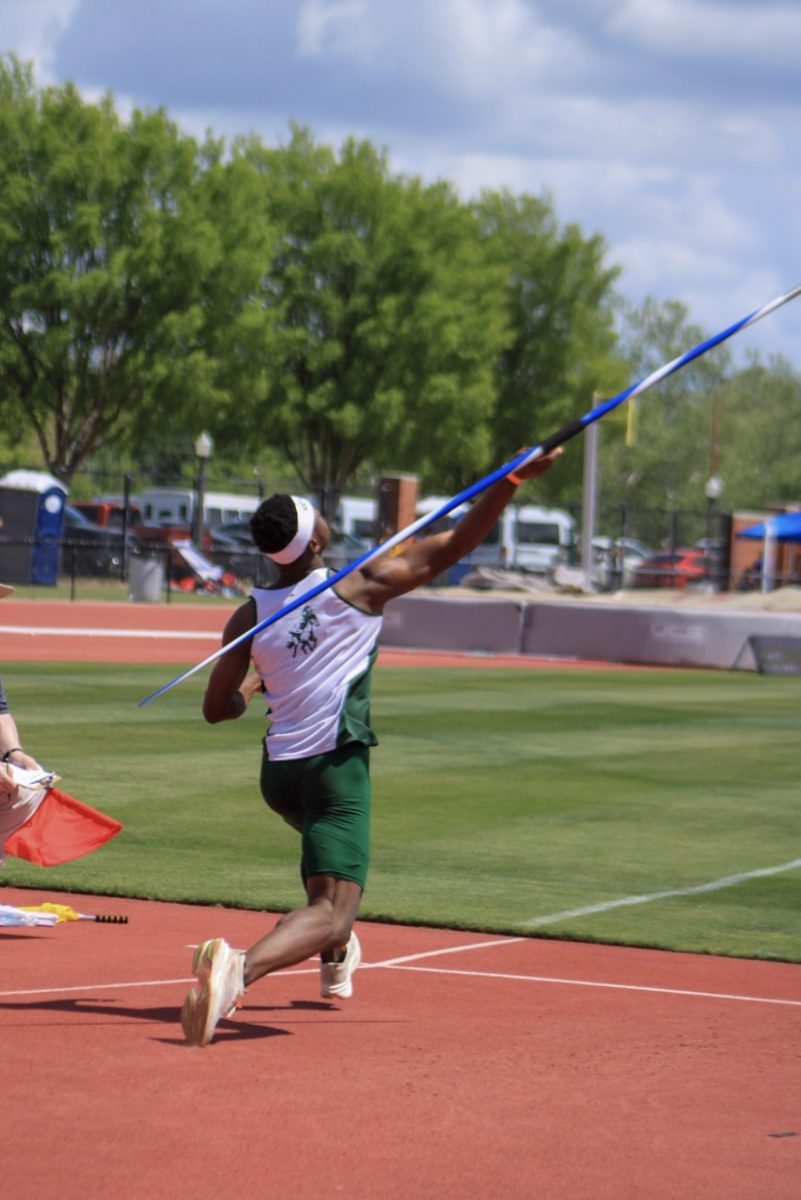 Senior Crispin Mbii throws the javelin at the John Jacobs Invitational held at the University of Oklahoma on April 10.
