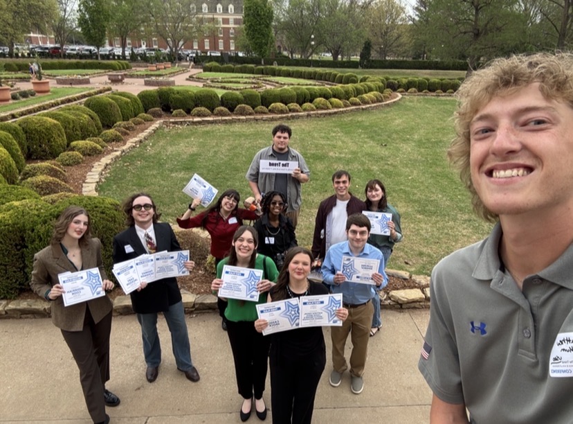 The Trend's representatives smile with their awards at the Oklahoma Collegiate Media Association (OCMA) Conference held on the Oklahoma State University (OSU) campus on April 1.